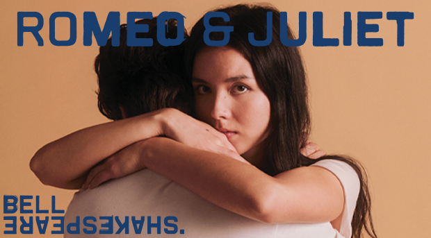 A promo image of Juliet and Romeo embracing with Juliet looking at the camera with Bell Shakespeare's logo in the corner.