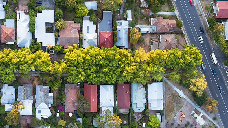 Aerial view of houses near highway