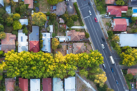 Aerial view of houses near highway