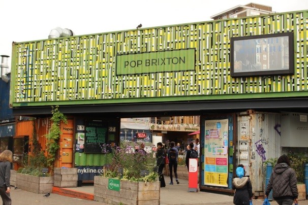 Outside view of a pop up exhibition built from containers